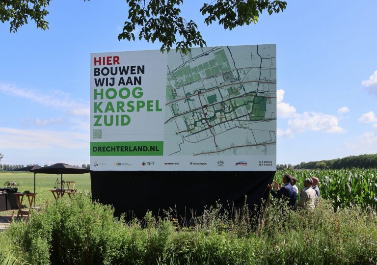 onthulling bouwbord